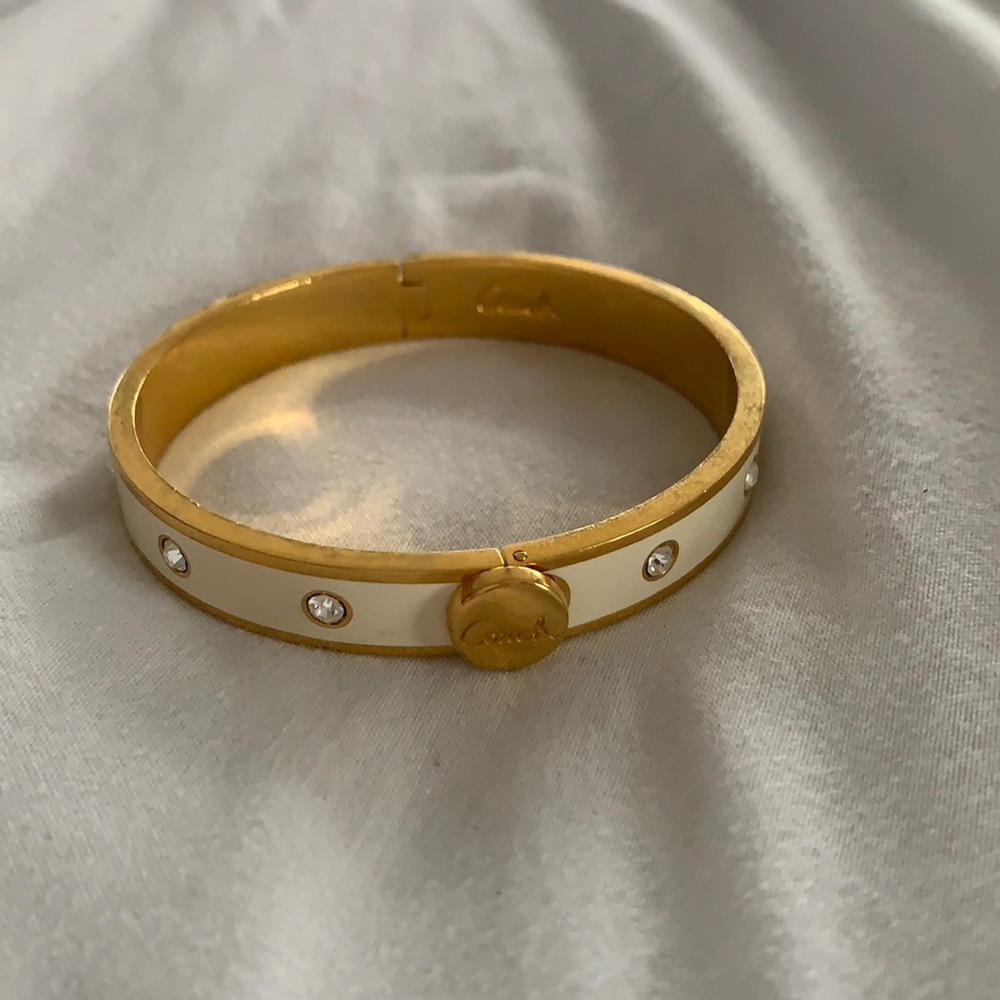 Coach white enamel & gold hinge bangle bracelet